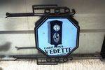 Vedette Wall Clock Double Sided Enamel Sign Arriving Nov