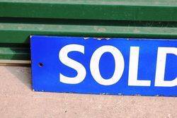 Sold By Enamel Sign