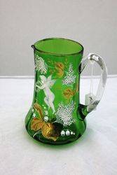 Victorian Green Glass Jug In The Mary Gregory Style.
