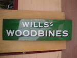 Wills Woodbine Strip Enamel Sign