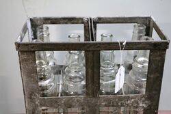 8 Vintage Embossed Essolube Oil Bottles in Original Crate