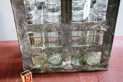 8 Vintage Embossed Essolube Oil Bottles in Original Crate