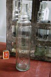 8 Vintage Embossed Essolube Oil Bottles in Original Crate