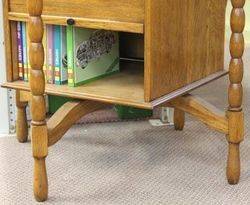 Oak Revolving Display Cabinet with Rolling Front and Back Doors