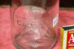 A Good Vintage Caltex One Quart Oil Bottle