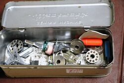 A Vintage Boxed Sewing Machine Attachments Kit