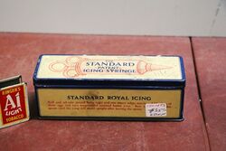 A Vintage Standard Icing Syringe Tin With Contents