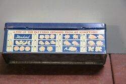 A Vintage Standard Icing Syringe Tin With Contents