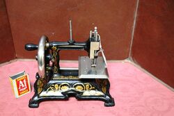 Antique C19th German Miniature Cast Iron Sewing Machine. #