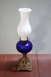 Antique Kerosene Lamp on Cast Iron Base #