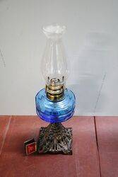 Antique Kerosene Lamp on Cast Iron Base 