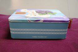 Arnotts Biscuit Tin Violets in White Vase