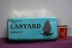 COL. Ogden's Lanyard Circular Tobacco tin 