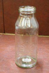 Early Embossed Shell Quart Oil Bottle