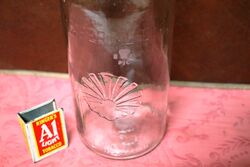 Early Vintage Embossed One Quart Oil Bottle