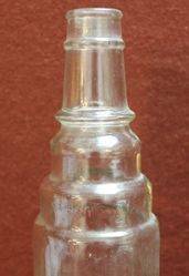 Embossed Essolube Quart Bottle