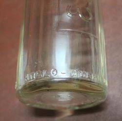 Embossed Essolube Quart Bottle