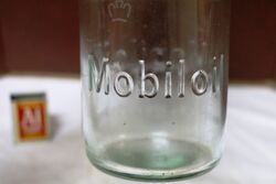 Embossed Mobiloil 1 quart Bottle and Tin Top