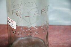 Genuine Texaco Embossed 1 quart Oil Bottle
