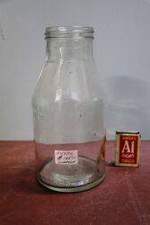 Genuine Vacuum Imperial Quart Oil Bottle.