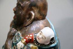 Japanese Porcelain Buda with Child   
