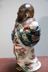 Japanese Porcelain Buda with Child   