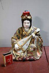 Japanese Porcelain Seated Geisha Girl. #