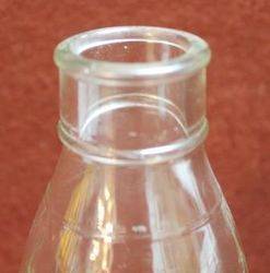 New Zealand Embossed Shell Quart Bottle