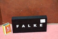 Plastic Falke Paper Weight.