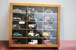 Shadowed Boxed Selection of 15 Model Cars