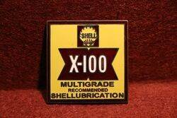 Shell X100 Enamel Badge.