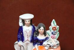 Small C19th Staffordshire Boy with Girl Figure 