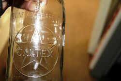 Vintage Caltex Embossed 1qt Oil Bottle 