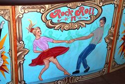 Vintage Curved Fairground Style Panel Depicting Rock n Roll 