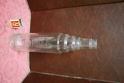 Vintage Embossed Essolube Quart Oil Bottle.