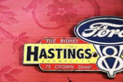 Vintage Ford Hastings and Deering Enamel Badge