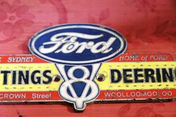 Vintage Ford Hastings and Deering Enamel Badge
