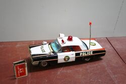 Vintage Japanese Tin Plate Model of a Police Car..
