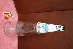 Vintage Mobiloil Embossed Quart Bottle with Arctic Tin Top. 