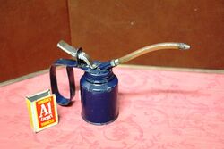 Vintage Small Thumb Pump Oiler with a Flexible Spout.