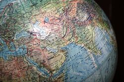 Vintage World Desk Globe on Wood Grain Base